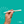 The flexible adapter tube held in the hand, showing the ribbed section that lets it bend