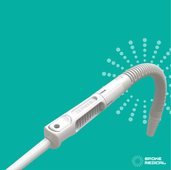 Zephyr device with its adapter tube attached, the tube curving to the right and the fingertip port in view